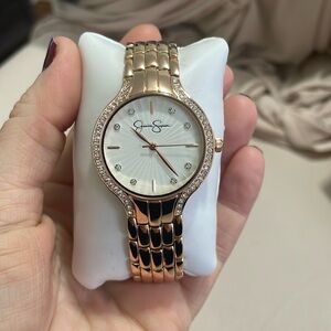 Jessica Simpson watch rose gold never warn or used